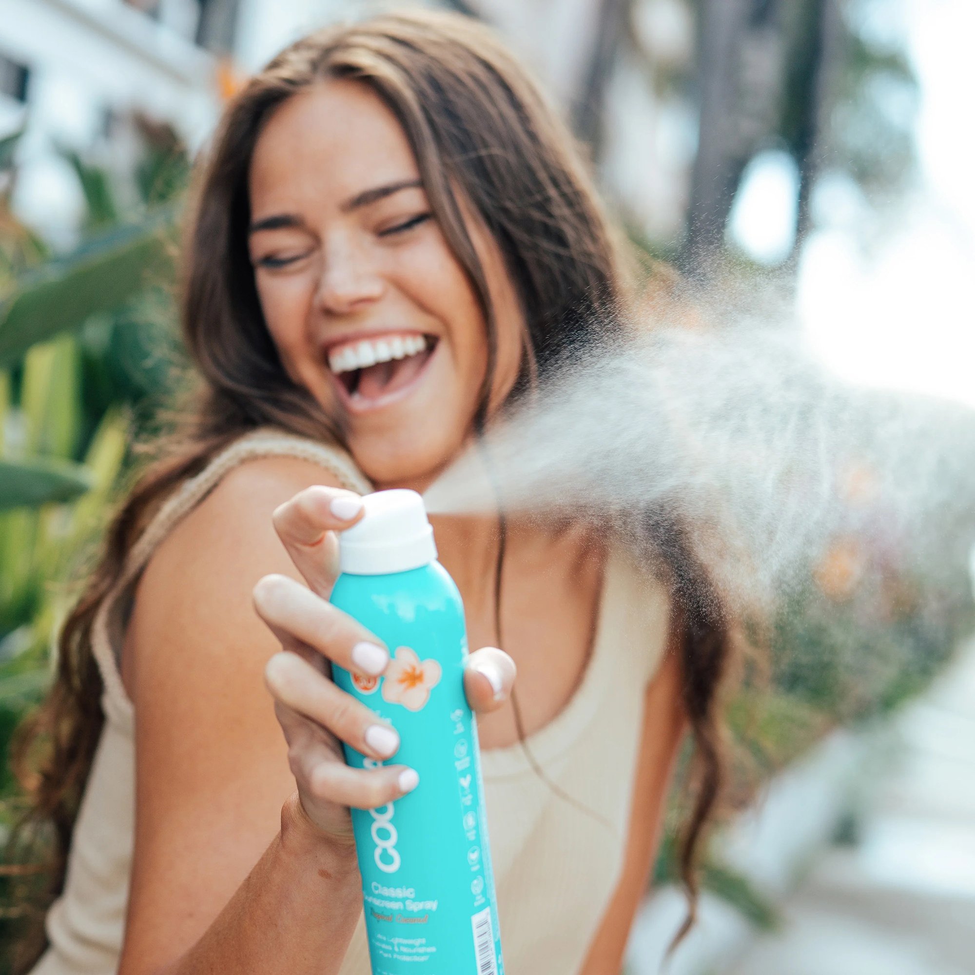 Coola® Clear Body Sunscreen Spray SPF 30 Tropical Coconut Scent, 6-ounce Can - Image 4